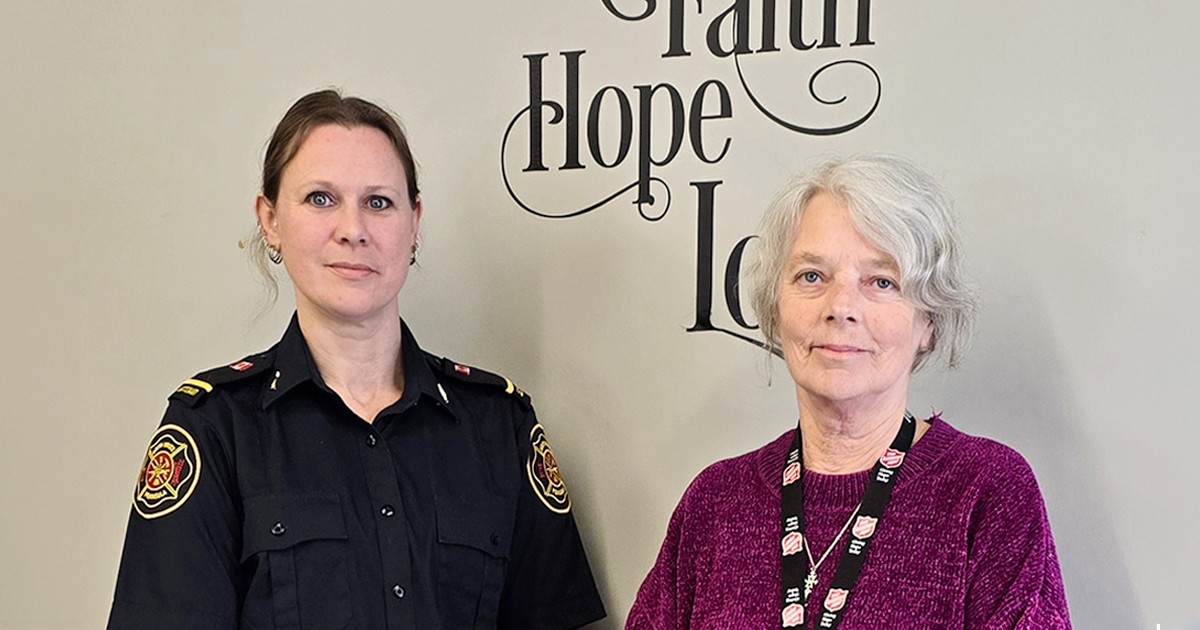 Firefighter Lieutenant MaryAnn Brown (left) with Patricia Huber